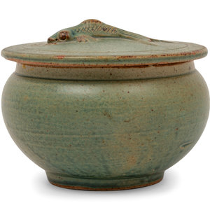 Appraisal: A Celadon Glazed Pottery Covered Jar of compressed form the