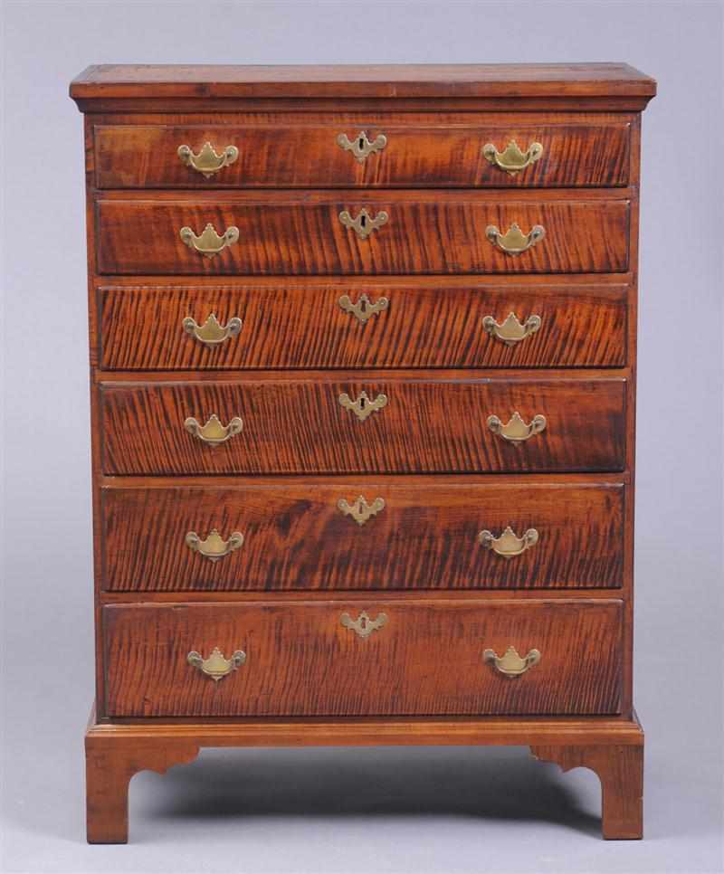 Appraisal: AMERICAN CHIPPENDALE FIGURED MAPLE TALL CHEST OF DRAWERS The molded