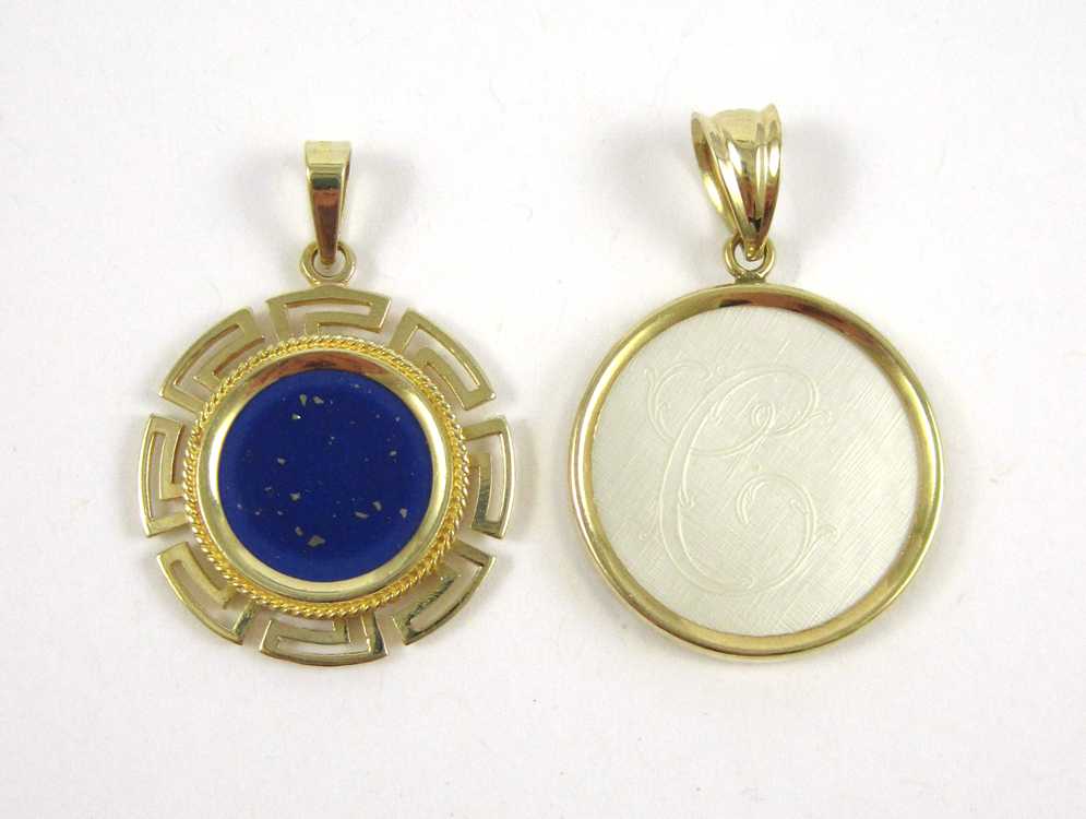 Appraisal: TWO FOURTEEN KARAT YELLOW GOLD PENDANTS including a yellow gold