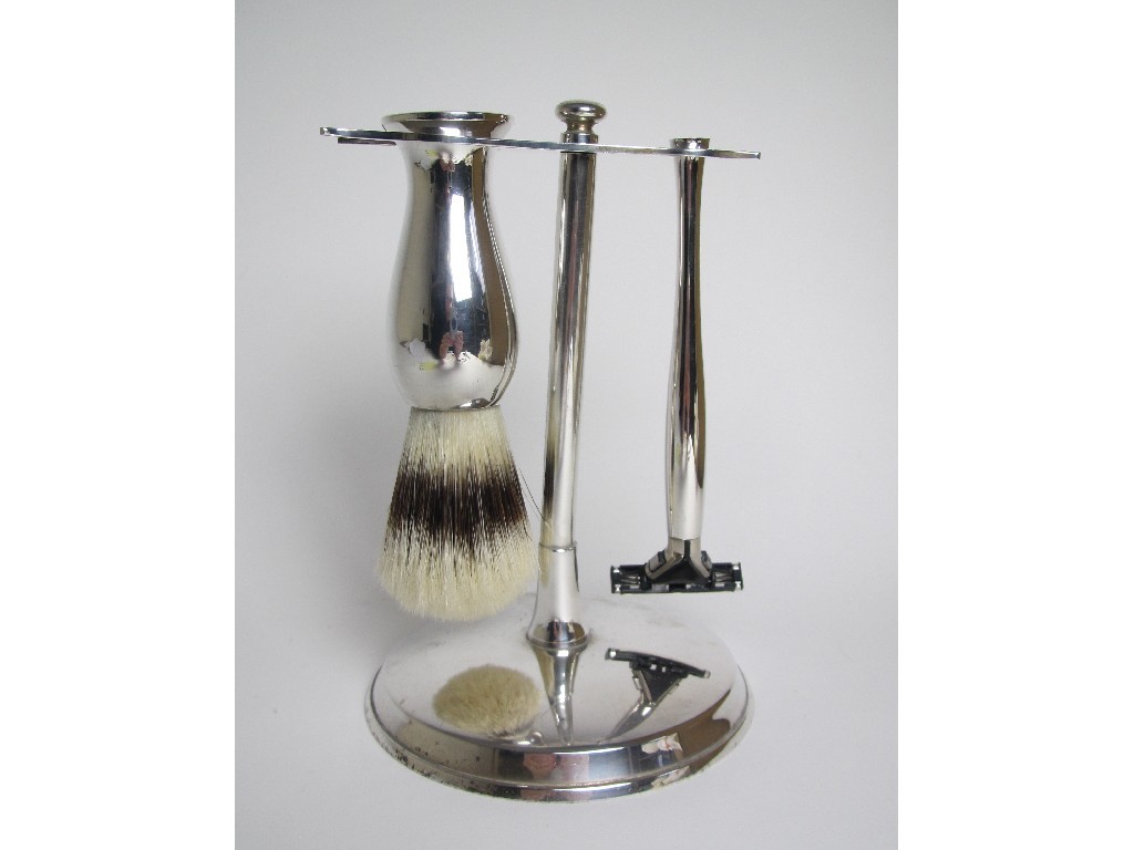 Appraisal: A modern silver shaving set on stand comprising shaving brush