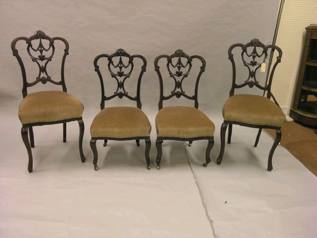 Appraisal: A pair of Edwardian mahogany drawing room single chairs and