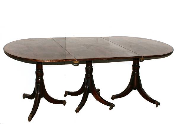 Appraisal: A George III style mahogany triple pedestal dining table height