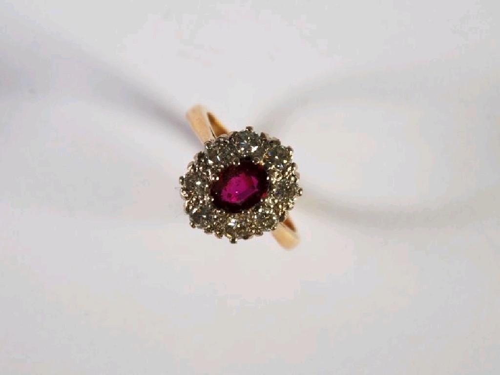 Appraisal: ct GOLD RUBY AND DIAMOND CLUSTER RING set with a