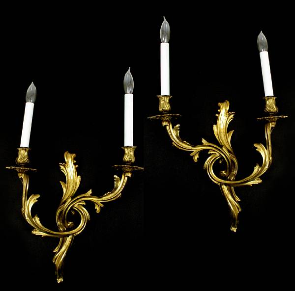 Appraisal: A pair of Louis XV style gilt bronze two light