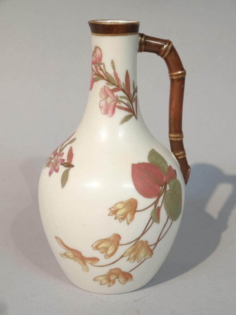 Appraisal: A late thC Royal Worcester jug the bulbous body decorated