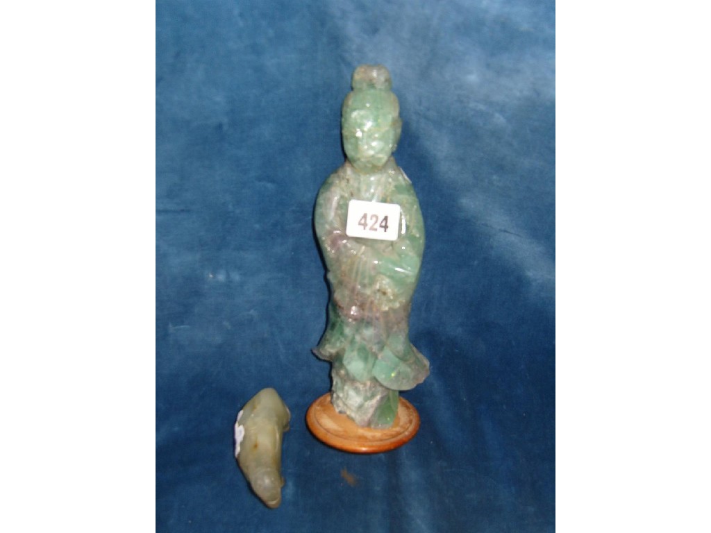 Appraisal: A carved eastern green crystal figure of a woman together