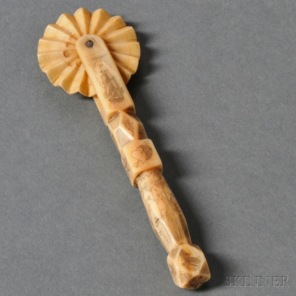 Appraisal: Scrimshaw Carved and Decorated Bone Jagging Wheel with faceted carved