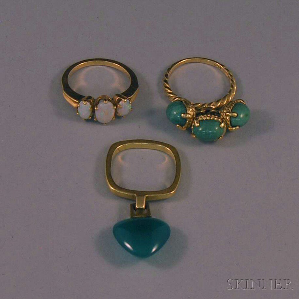 Appraisal: Three Gold Rings a kt gold and opal three-stone band