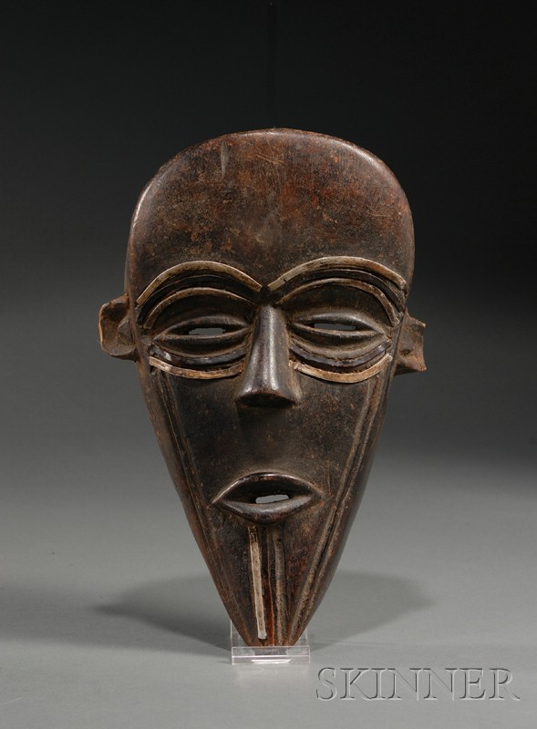 Appraisal: African Carved Wood Mask Dan the hollow form with long