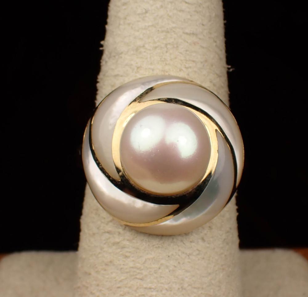 Appraisal: PEARL MOTHER-OF-PEARL AND FOURTEEN KARAT GOLD RING The yellow gold