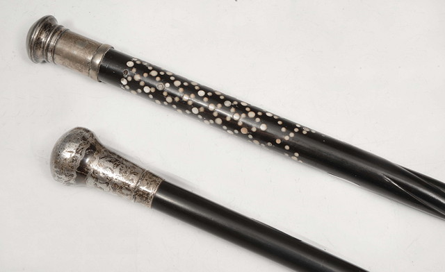 Appraisal: A COLONIAL HARDWOOD AND BONE INLAID WALKING CANE and another