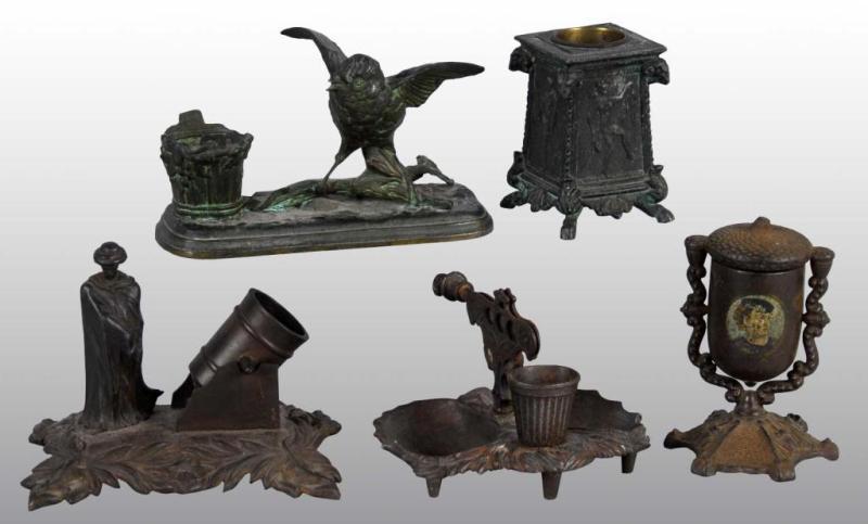 Appraisal: Lot of Cast Iron Match Vesta Holders Description Holders include