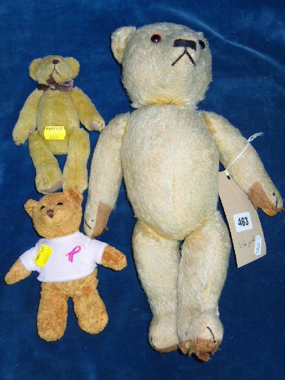 Appraisal: A yellow plush teddy with growl mechanism and stitched nose