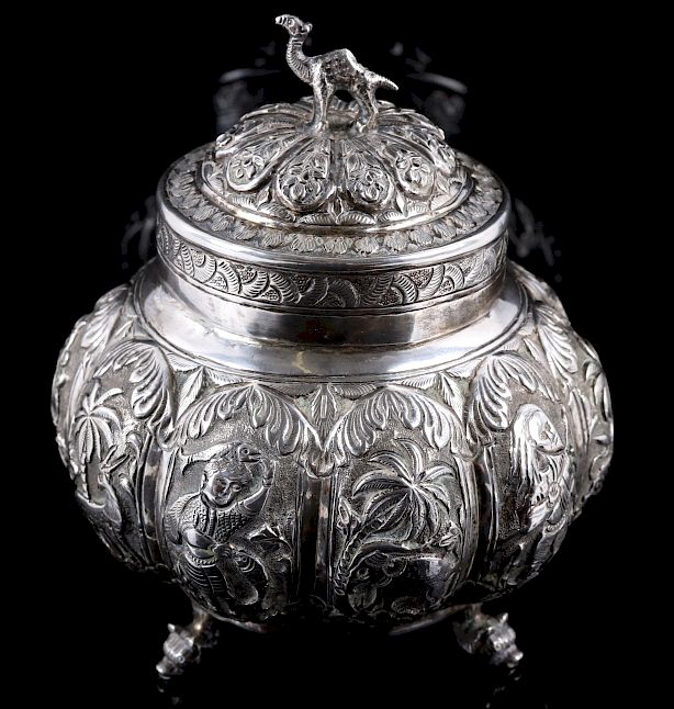 Appraisal: Bohemian Ornate Silver Camel Jar with Lid Offered in this