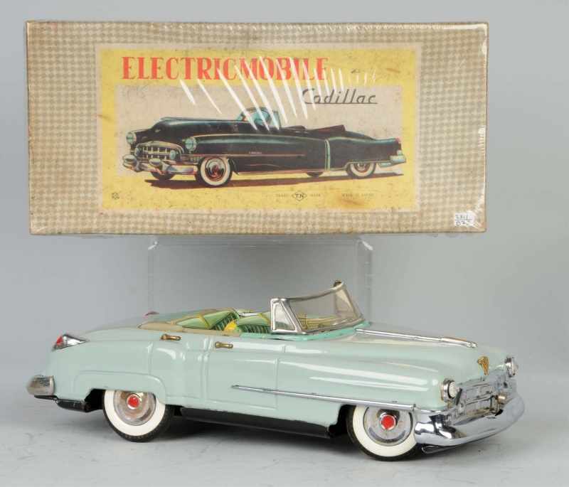 Appraisal: Tin Electricmobile Cadillac Battery-Op Toy Description Japanese Circa Working Made