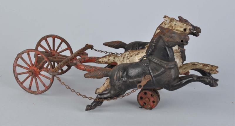 Appraisal: Cast Iron Dent Front End Three articulated horses with yoke