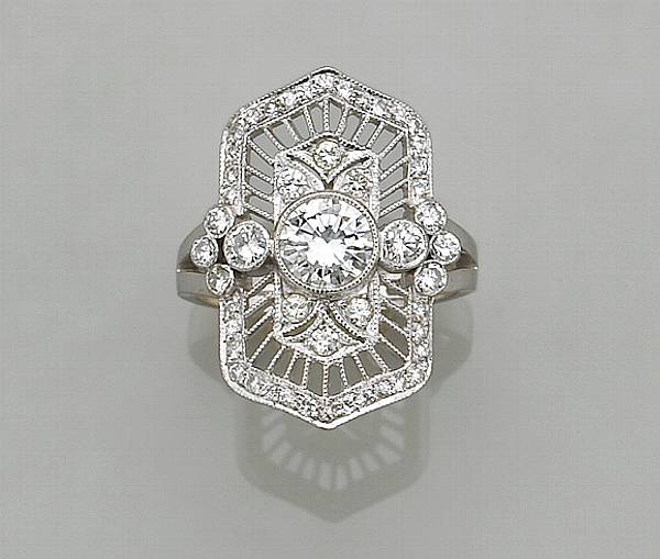 Appraisal: A diamond and eighteen karat white gold filigree ring estimated