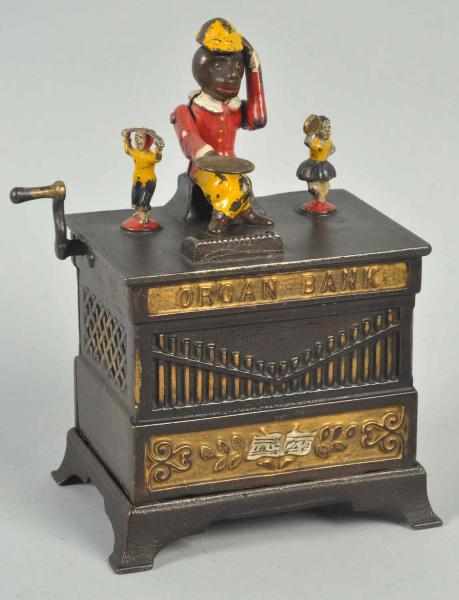 Appraisal: Cast Iron Organ Boy Girl Mechanical Bank Red coat variation