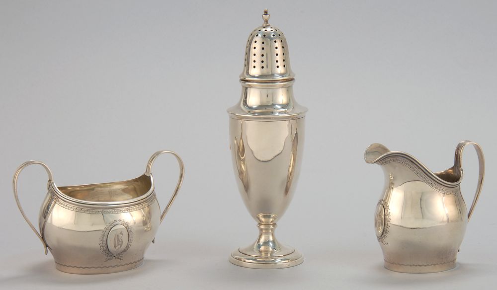 Appraisal: THREE PIECES OF STERLING SILVER HOLLOWWARE A handwrought creamer and