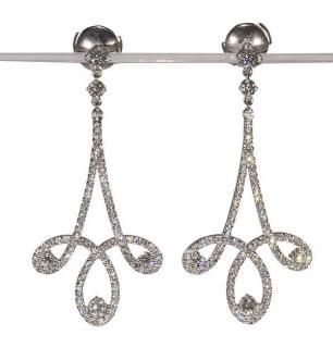 Appraisal: Pair of Tiffany Co Enchant diamond and platinum scroll earrings