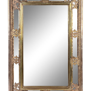 Appraisal: A Baroque Style Repouseed Brass and Beveled Glass Rectangular Mirror