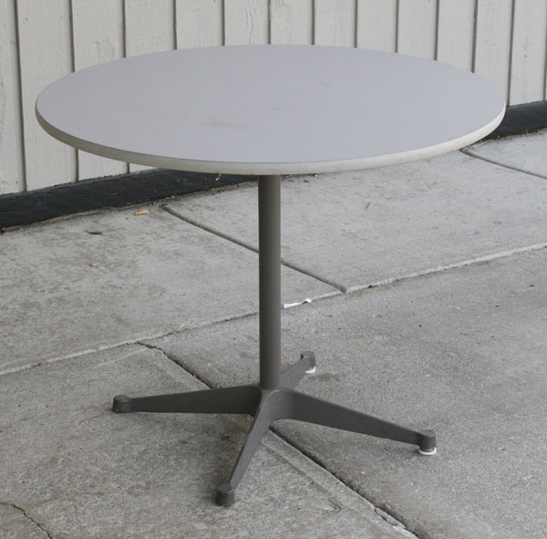 Appraisal: Herman Miller round dinette table with laminate top and X