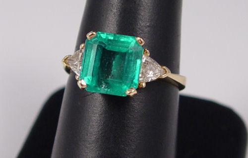 Appraisal: CT EMERALD RING WITH CT DIAMONDS The emerald you've been