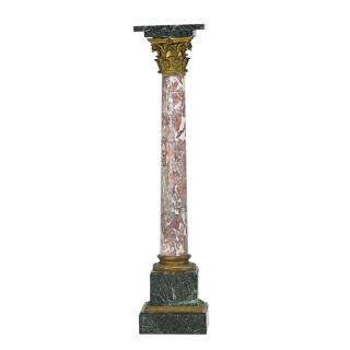 Appraisal: MARBLE TOP PEDESTAL Bronze mounted on variegated pedestal base Continental