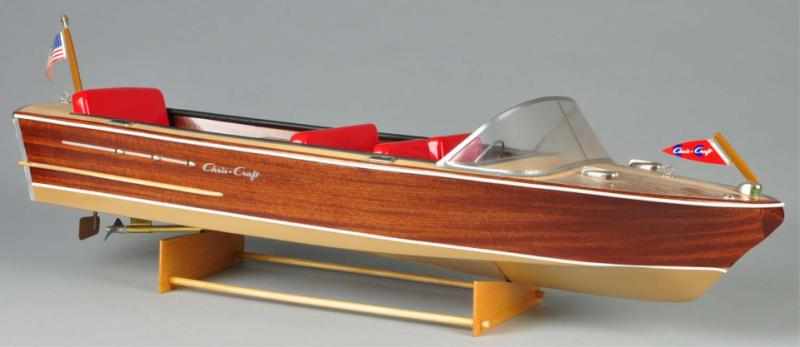 Appraisal: Contemporary Plastic Wood Chris Craft Model Description Comes with stand