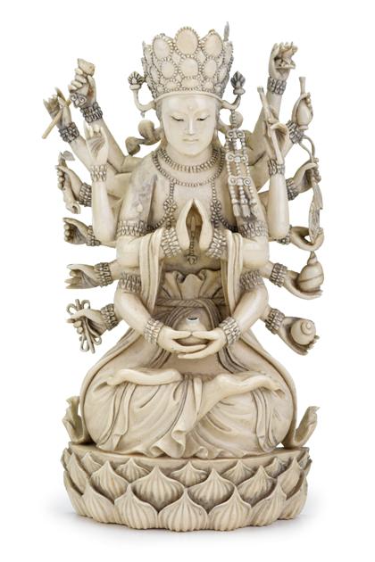 Appraisal: Chinese elephant ivory figure of AvalokitesvaraThe eighteen arm deity seated