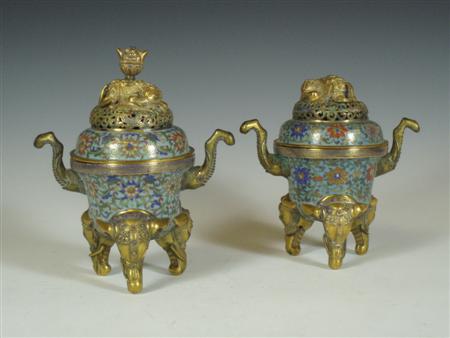 Appraisal: Two Chinese cloisonn enamel twin handled censers each cover surmounted