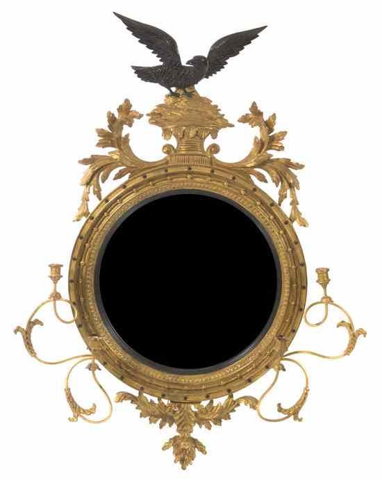 Appraisal: An American Federal Style Giltwood Bullseye Mirror surmounted by an