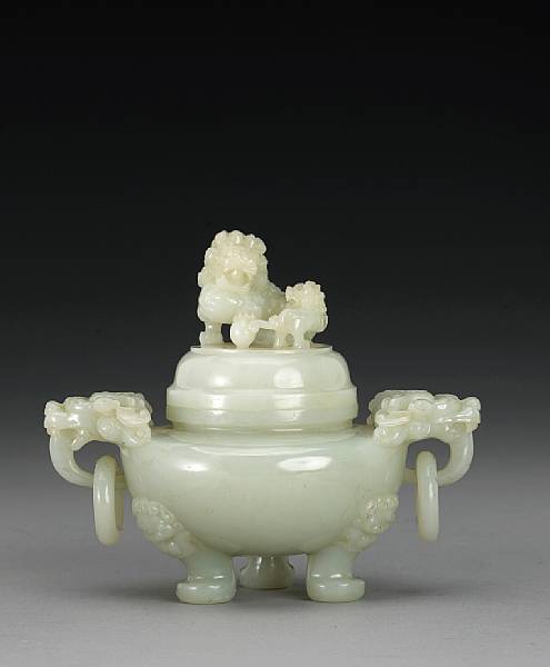 Appraisal: A carved white jade covered censer Of compressed globular form