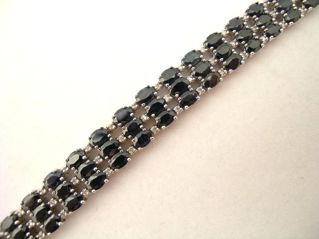 Appraisal: K white gold diamond and sapphire line bracelet long sixty