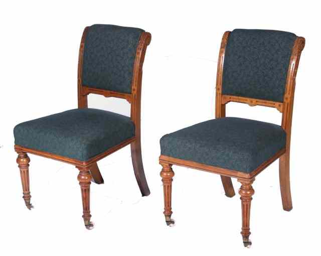 Appraisal: A SET OF FOUR VICTORIAN OAK DINING CHAIRS with upholstered