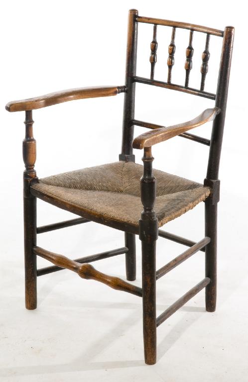 Appraisal: GEORGE III PROVINCIAL ELM SPINDLE-BACK OPEN ARMCHAIR the rush-seat flanked