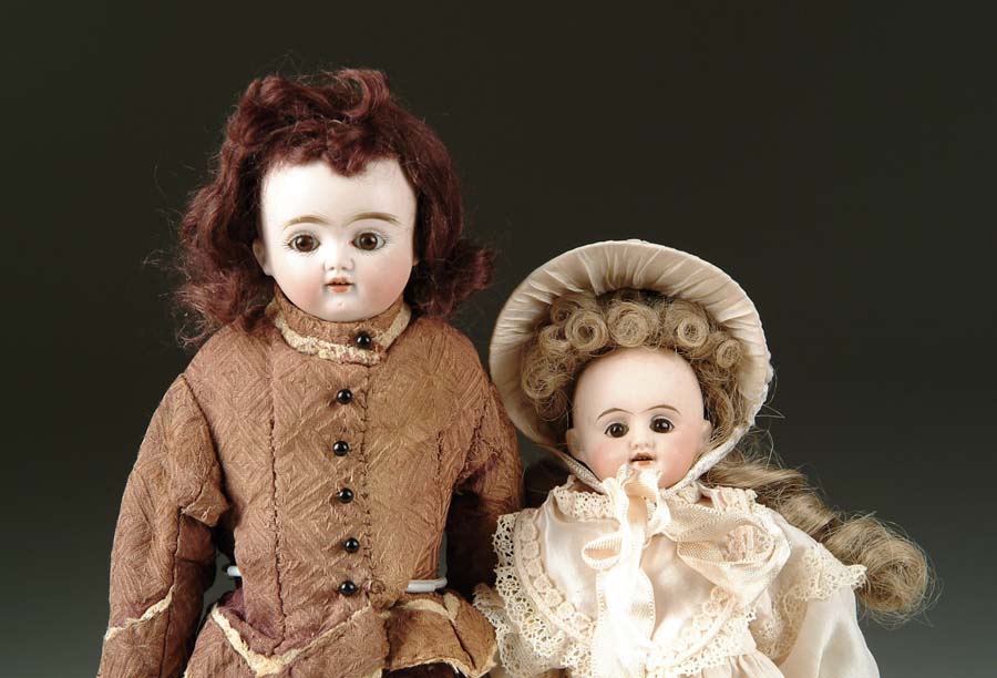 Appraisal: LOT OF TWO GERMAN BISQUE SHOULDER HEAD DOLLS Kestner doll