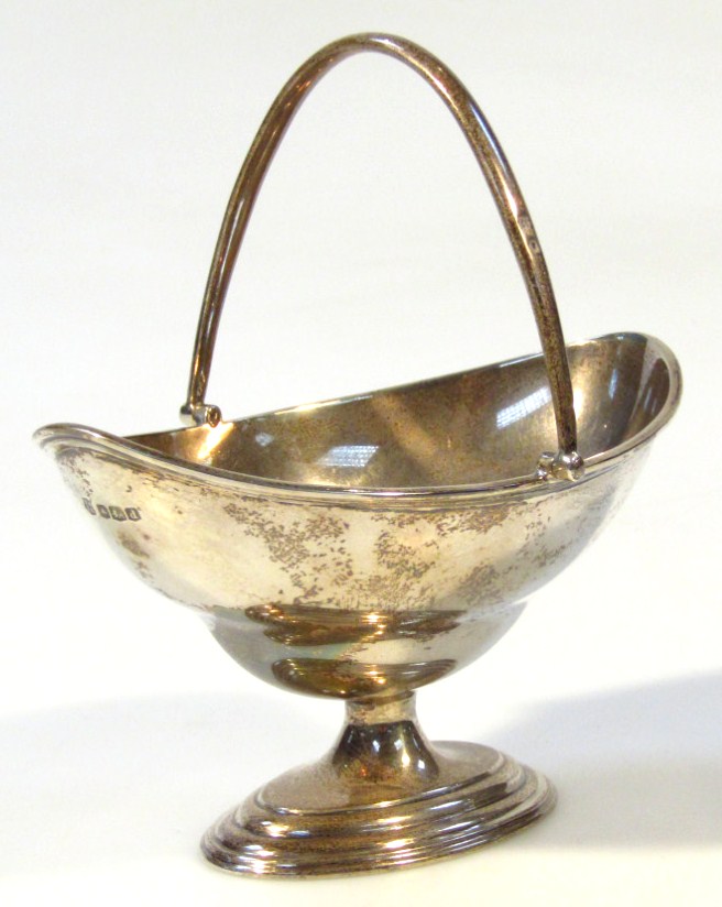 Appraisal: A George V silver basket by TH S the boat