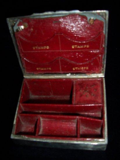 Appraisal: A silver stamp box lined with red leather cm wide