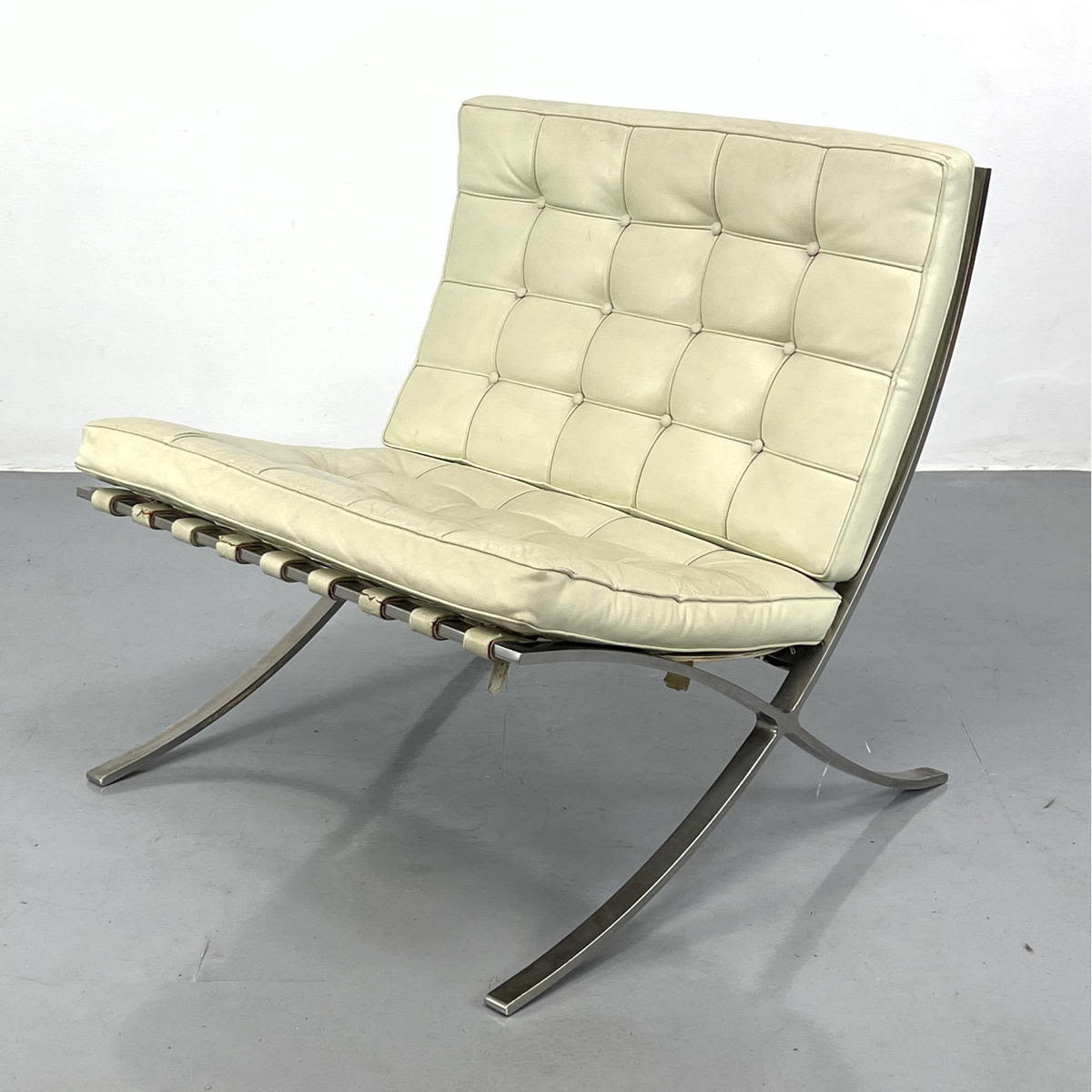 Appraisal: Chrome Frame Barcelona style Lounge Chair Tufted Cream Leather Upholstery