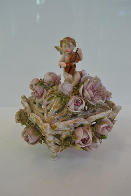 Appraisal: MEISSEN POTPORRI BASKET WITH VIOLIN PLAYING CHERUB FINIAL A F