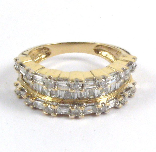 Appraisal: DIAMOND AND TEN KARAT GOLD RING set with three parallel