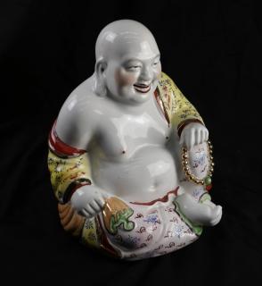 Appraisal: A Chinese Glazed Ceramic Buddha Figure A th century Chinese