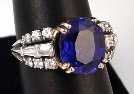 Appraisal: PLATINUM SAPPHIRE DIAMOND RING Platinum ring contains one oval shaped