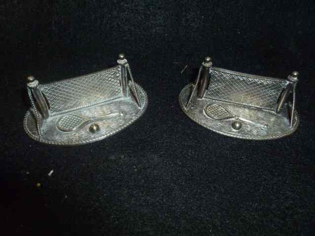 Appraisal: A PAIR OF VICTORIAN SILVER PLATED KNIFE RESTS in the