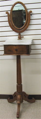 Appraisal: VICTORIAN MAHOGANY SHAVING STAND American th century Surmounting the back