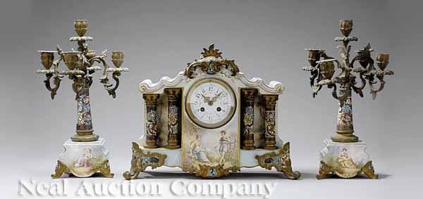 Appraisal: A French Bronze-Mounted Porcelain and Champleve Enamel Clock Garniture late