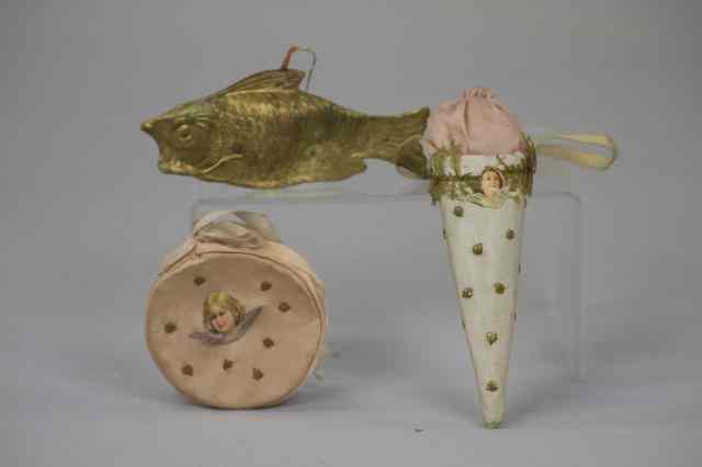 Appraisal: TWO SILK SACKS AND DRESDEN FISH ORNAMENTS Germany ornaments include