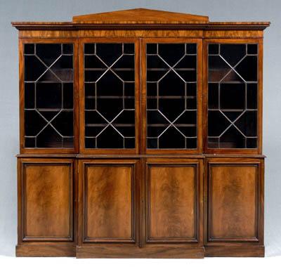 Appraisal: Very fine Regency breakfront bookcase highly figured mahogany with finely