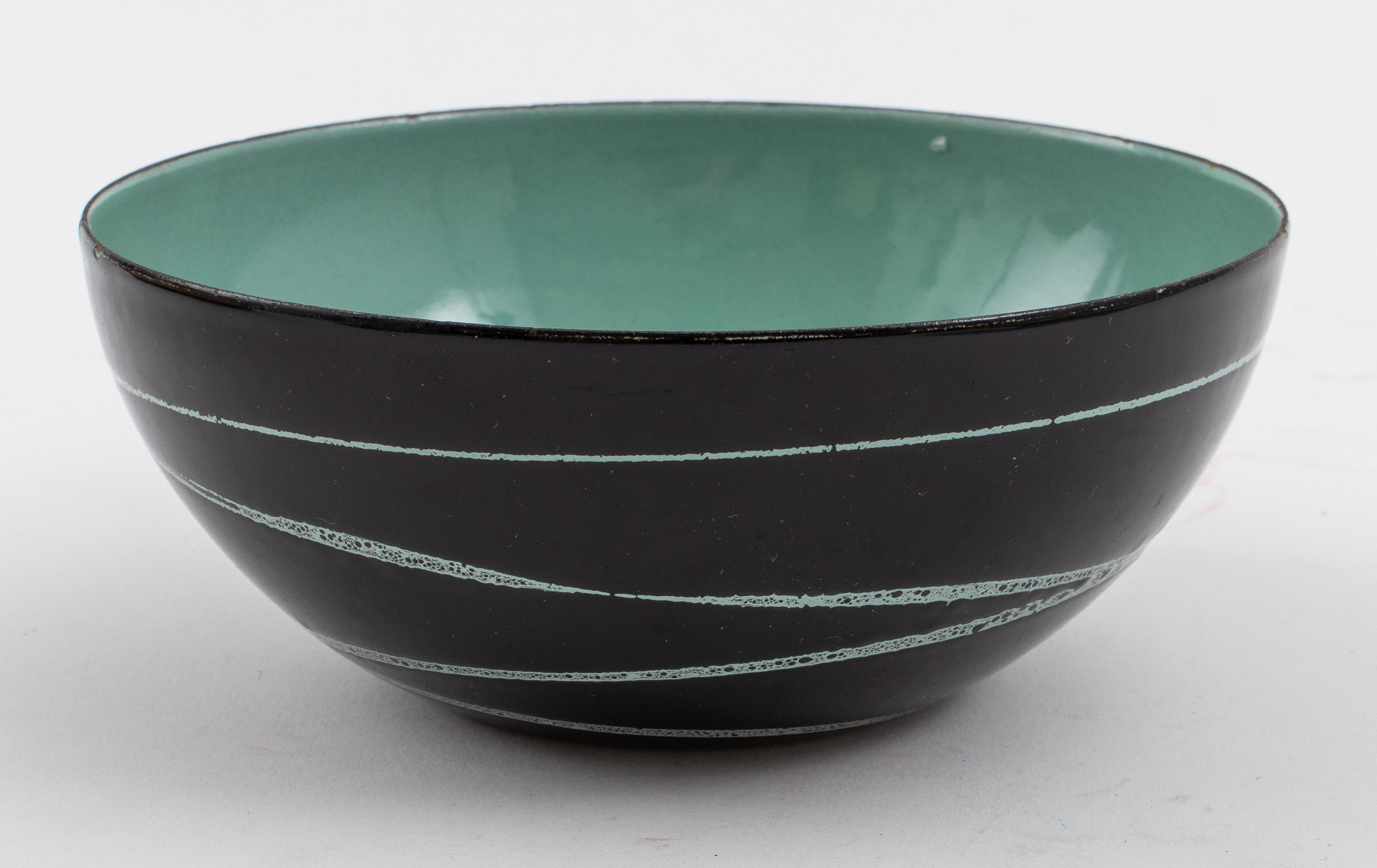 Appraisal: MODERNIST ENAMEL MINT GREEN BLACK BOWL Modernist mint green and